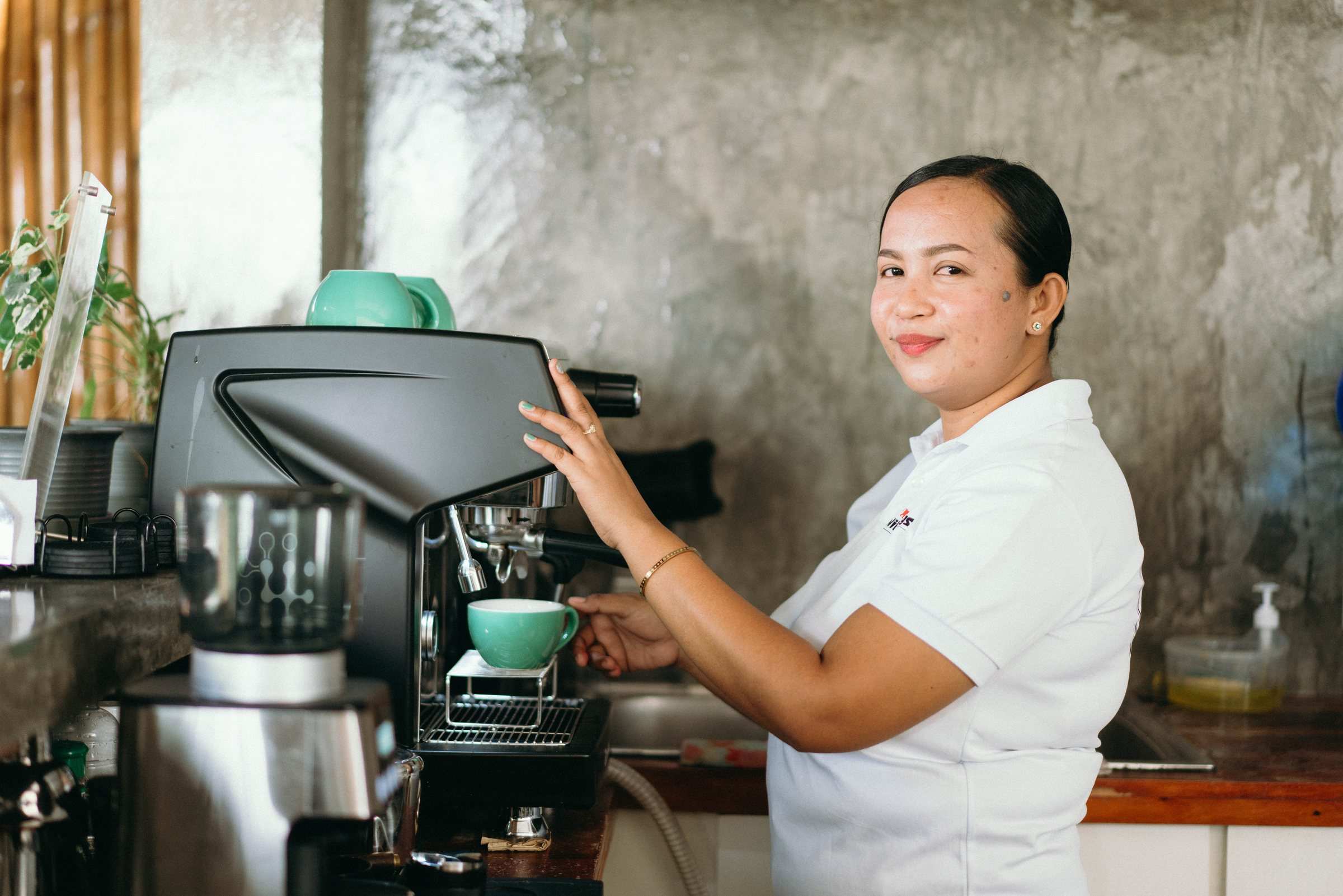 Barista at the espresso machine