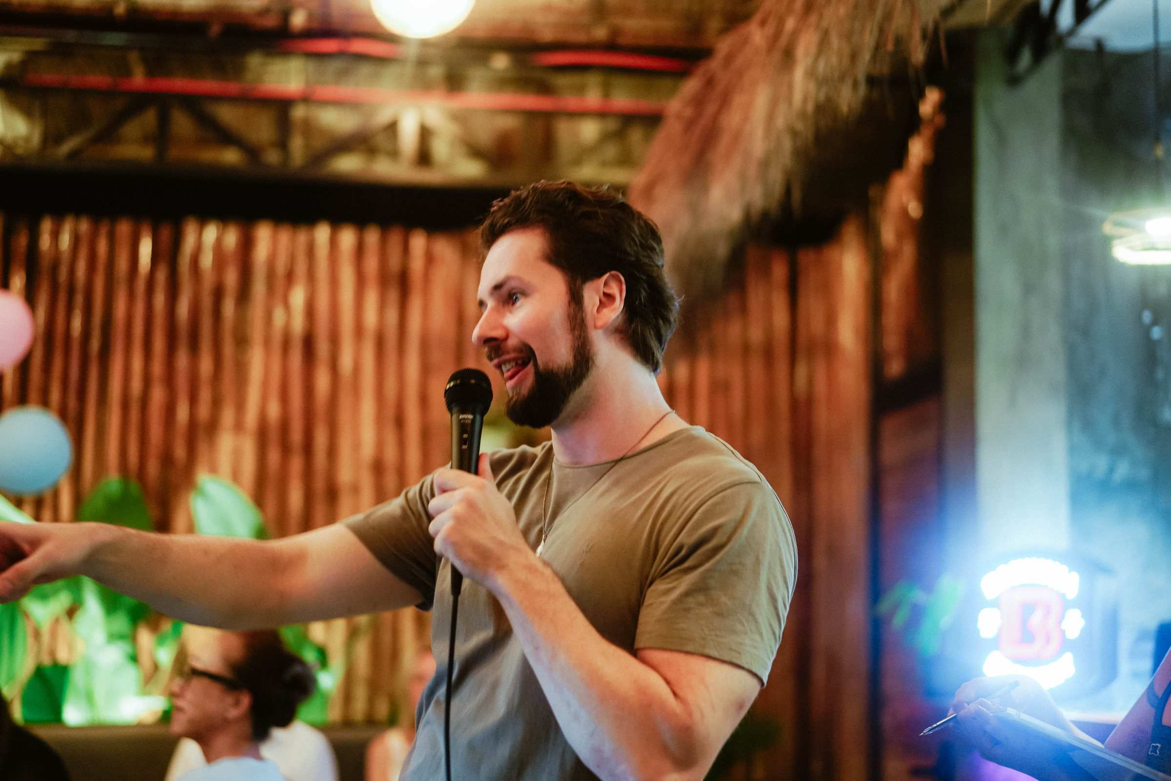 Host with the microphone