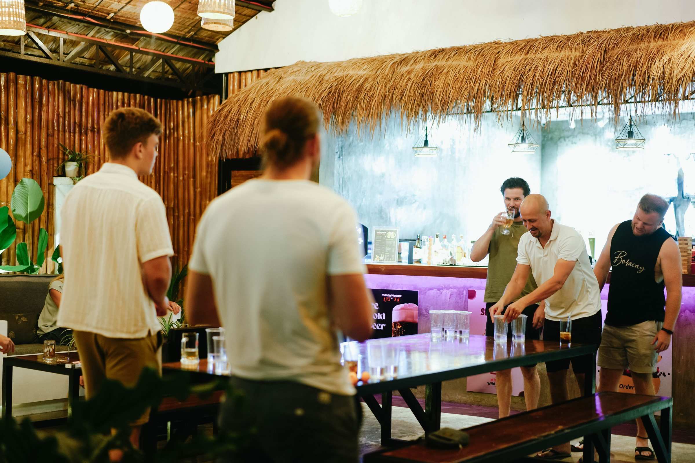 Beer pong at the long table