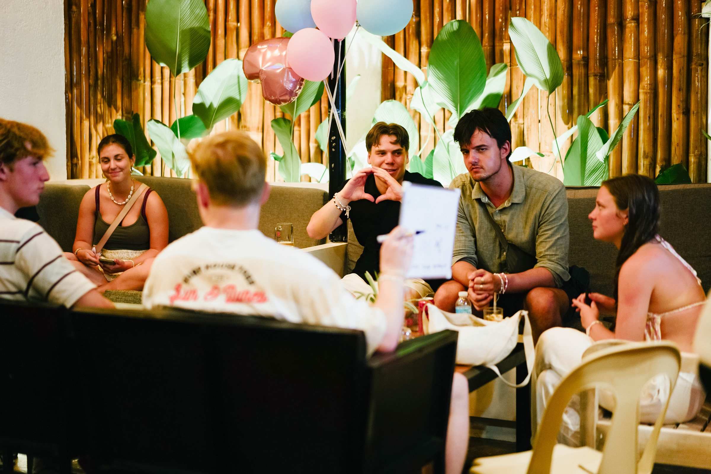 Group playing a quiz in the lounge