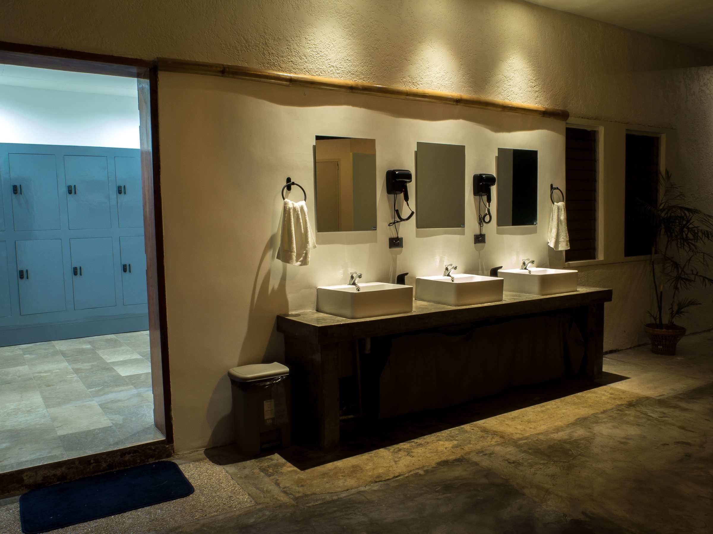Bathroom sinks next to the locker room