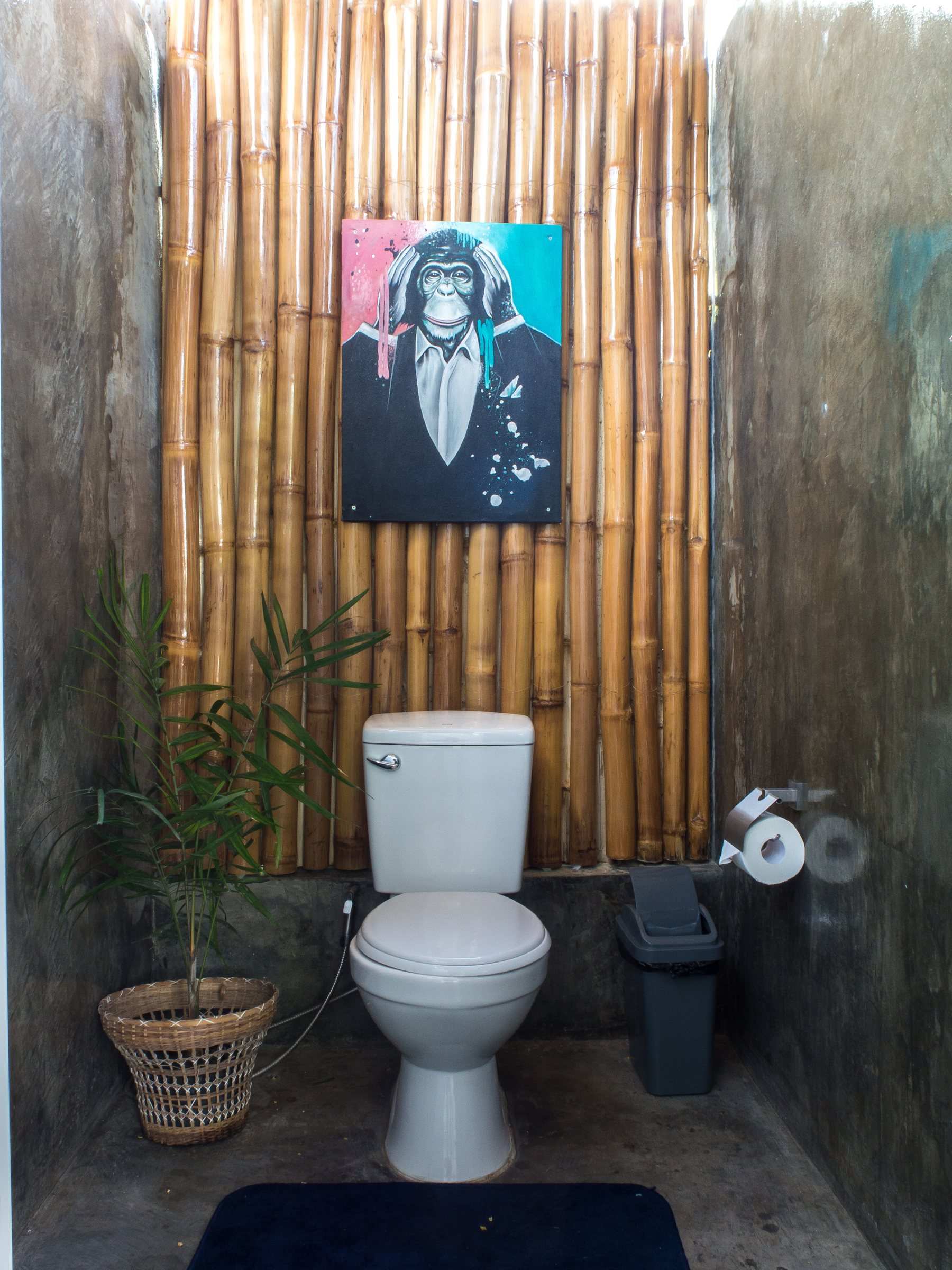 Toilet cubicle with bamboo wall