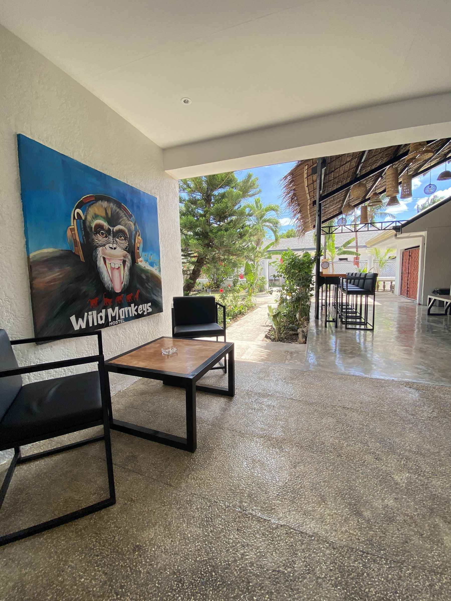 Lounge with the Wild Monkeys painting, looking out to the garden